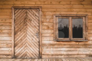Door and window of an ecological wooden house