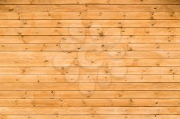 Wood plank brown texture background. Wooden house wall.
