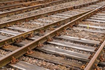 Empty railway or railroad tracks for train transportation