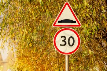 Road with speed limit 30 road sign, residential area
