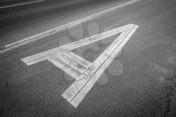 Letter A on asphalt road. Black and white photograph