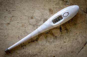Digital thermometer at a high temperature of 38,6 degrees