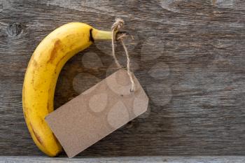 Fresh banana with blank tag. Copy space.