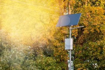 Modern street lighting pole with solar panel