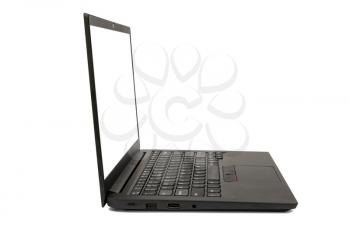 Black modern laptop with blank screen for copy space. Side view.