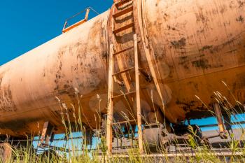 Low angle view of railway tank cars used to transport petroleum