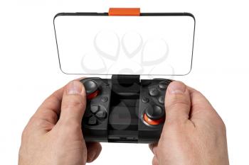 Game Pad with smartphone in hands isolated on white background .Mobile Gaming concept.