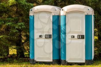 Portable toilets at an outdoor event in the public park