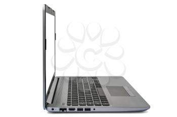 Laptop or notebook with blank screen, isolated on white background, side view.