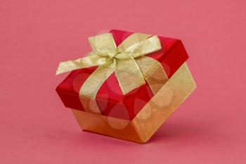 Luxury gift box on pink paper background