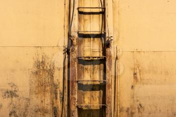 Ladder with access to a large tank, cargo tanks on the railway, transportation of oil or fuel