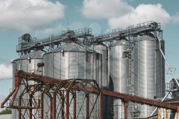 Modern silos for storing grain harvest.Agribusiness concept.