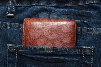 Brown leather purse in the pocket