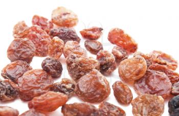 Group of raisins  located on the white background