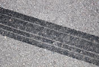Tire track on the asphalt, can use for background