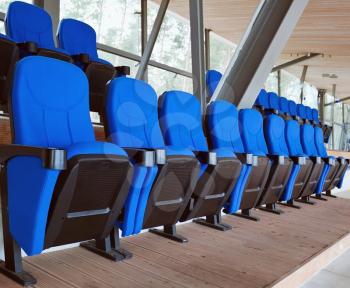 Soft blue chairs in the stadium