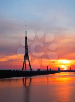 Television tower at sunset in summer time