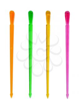 Set of color canape sticks on white background
