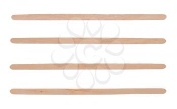 Coffee wooden stick stirrers on the white background