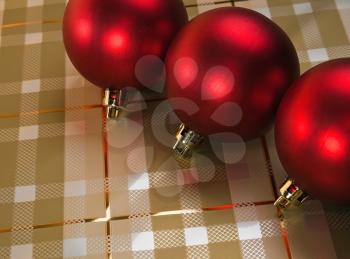 Three red holiday decorative ball