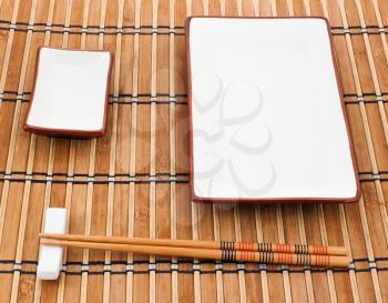 Sushi set for one on mat background