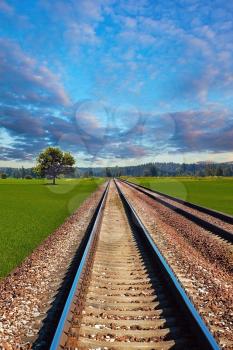 Railroad in the field on beautiful day
