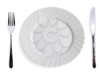 White dining plates and silverware on white background