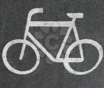 Bicycle sign on the asphalt