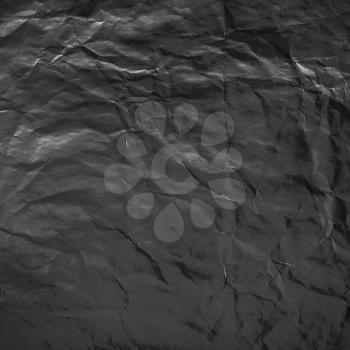 Wrinkled black blank paper surface