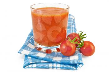 Royalty Free Photo of Tomato Juice and Tomatoes on a Napkin