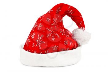 Red cap with a pattern of silver snowflakes, white fuzzy fringe and a white fur brush isolated on white background