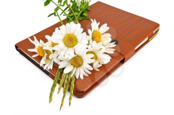 Brown notebook with a pen and a bouquet of daisies isolated on white background