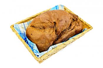 Rye homemade bread in a wicker basket with a blue napkin isolated on white background