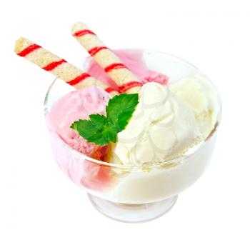 Pink and white ice cream with wafer rolls and mint in glass isolated on white background