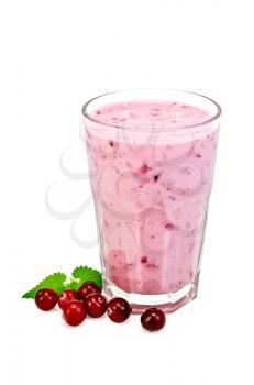 Milk cocktail with cranberries in a glass, mint isolated on white background