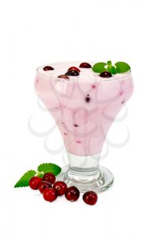 Thick yogurt in glass with cranberries, mint isolated on white background
