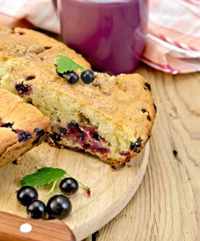 Royalty Free Photo of Currant Cake on a Board With a Knife