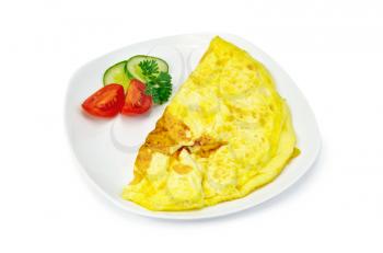 Omelette with slices of tomato, cucumber, parsley on the plate isolated on white background