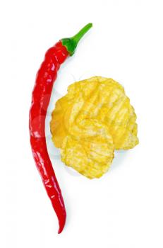 Grooved chips with spicy red pepper isolated on white background