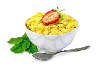 Cornflakes in a white bowl, berries and strawberry leaves, spoon isolated on white background