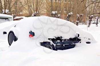 Snowbound car in a big snowfall