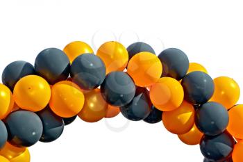 Balloons black and orange connected isolated on white background
