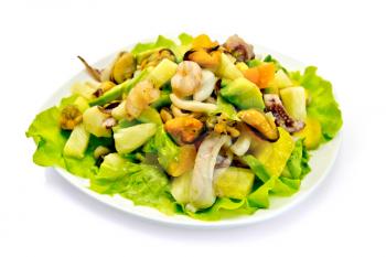 Salad with shrimps, octopus, mussels and calamari with avocado, lettuce, pineapple in a bowl isolated on white background