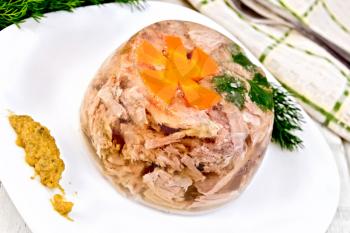 Jellied pork and beef with carrots and parsley on a plate with mustard and dill, kitchen towel on a background of wooden boards