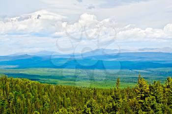 View of the ridge Kvarkush covered by forest in the Ural Mountains