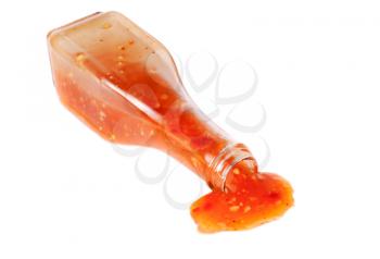 Royalty Free Photo of a Bottle Pouring Sauce