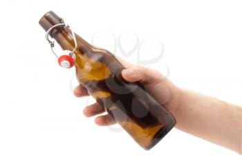 Royalty Free Photo of a Hand Holding an Empty Beer