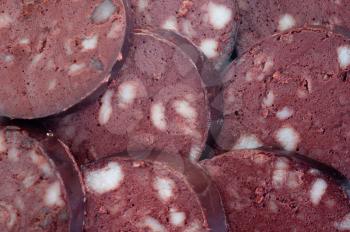 Royalty Free Photo of a Background of Sliced Salami