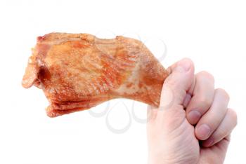 Royalty Free Photo of a Hand Holding a Chicken Leg