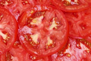 Royalty Free Photo of a Sliced Tomato Background